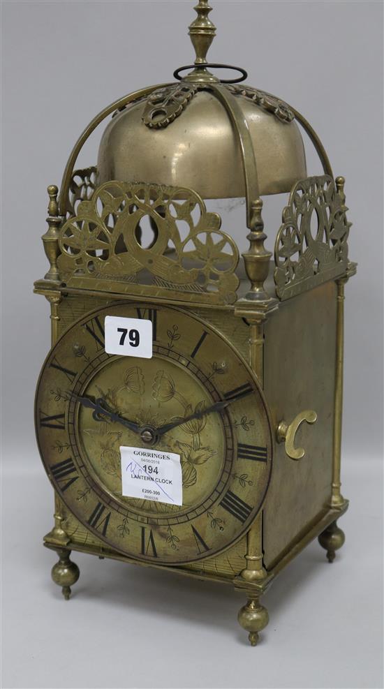 A lantern clock with later movement
